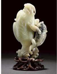 18th Century A celadon and grey jade carving of two carp